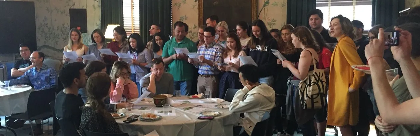 First year Russian students gathering together and singing a song.